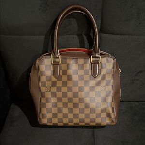 Stylish Checkered Handbag with Gold Accents